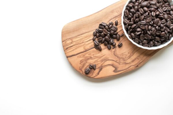 black beans on brown wooden chopping board